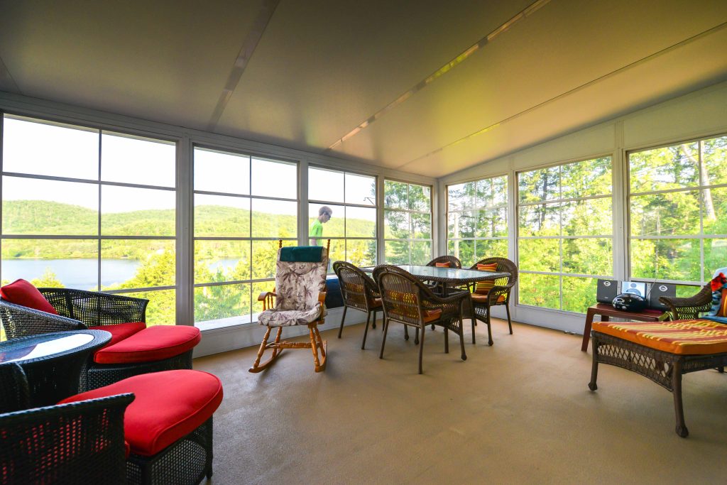 Brighten Your Home with a Stunning 3-Season Vinyl Sunroom Model 200.